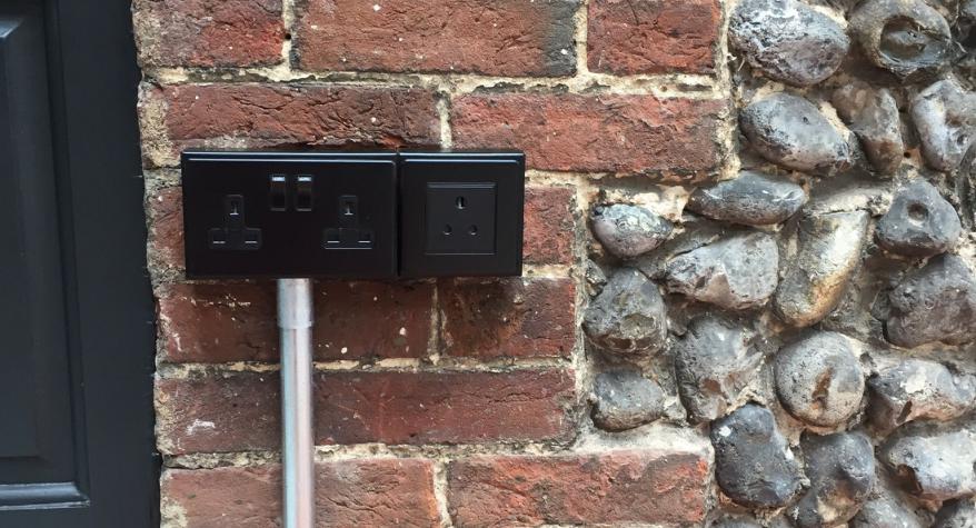 Surface Mounted Metal Conduit System In New Garden Room, Norwich
